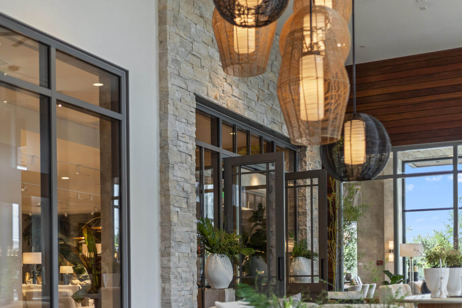 Modern interior with hanging woven lamps.