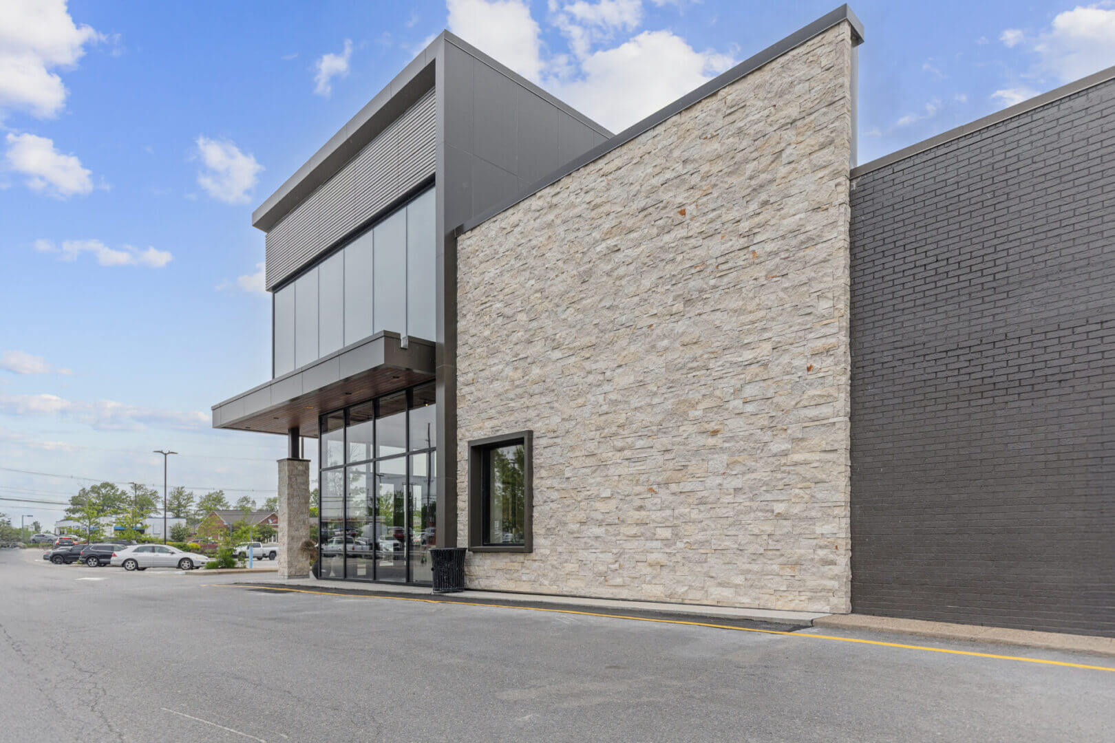 Modern commercial building with stone and glass
