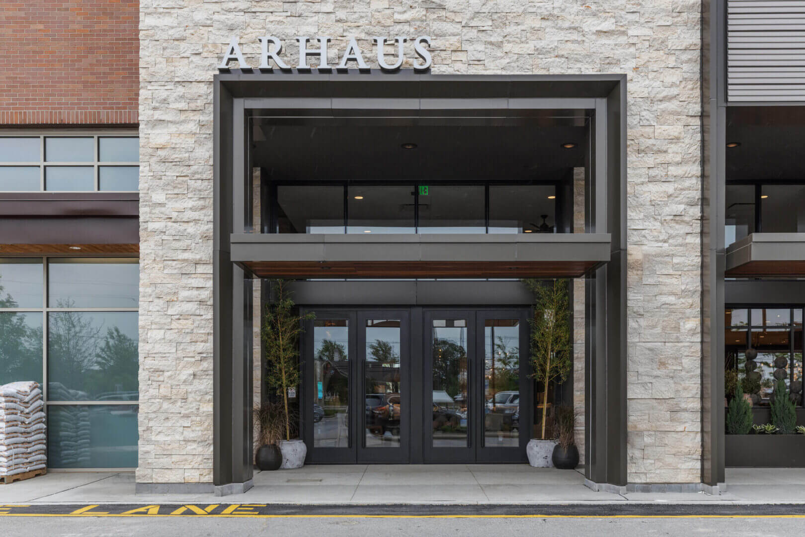 Storefront entrance with modern glass doors.